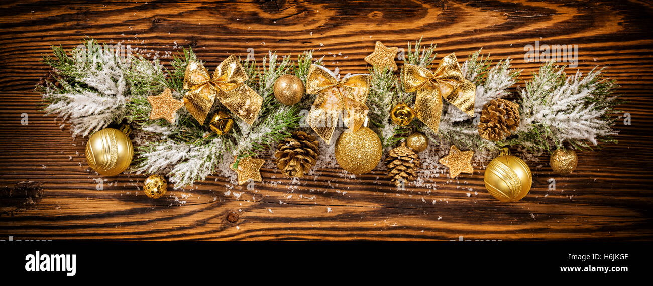 Christmas decoration with fir branches placed on old wooden planks ...