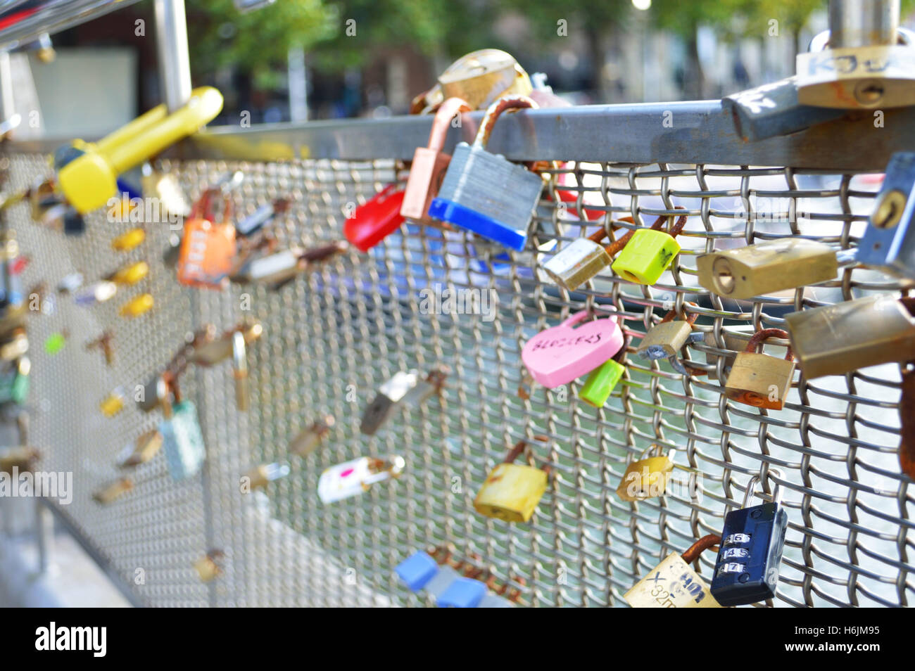 Love locks small coloured padlocks on Bristol's Pero bridge by the