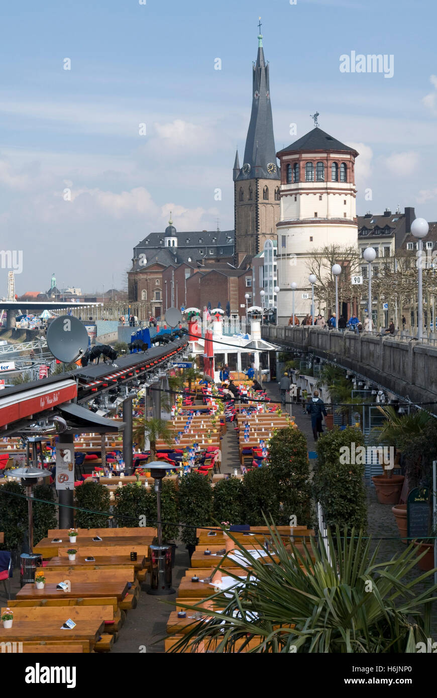 Restaurant and Schlossturm tower, Rheinuferpromenade, River Rhine Promenade, Duesseldorf, state capital of North Stock Photo