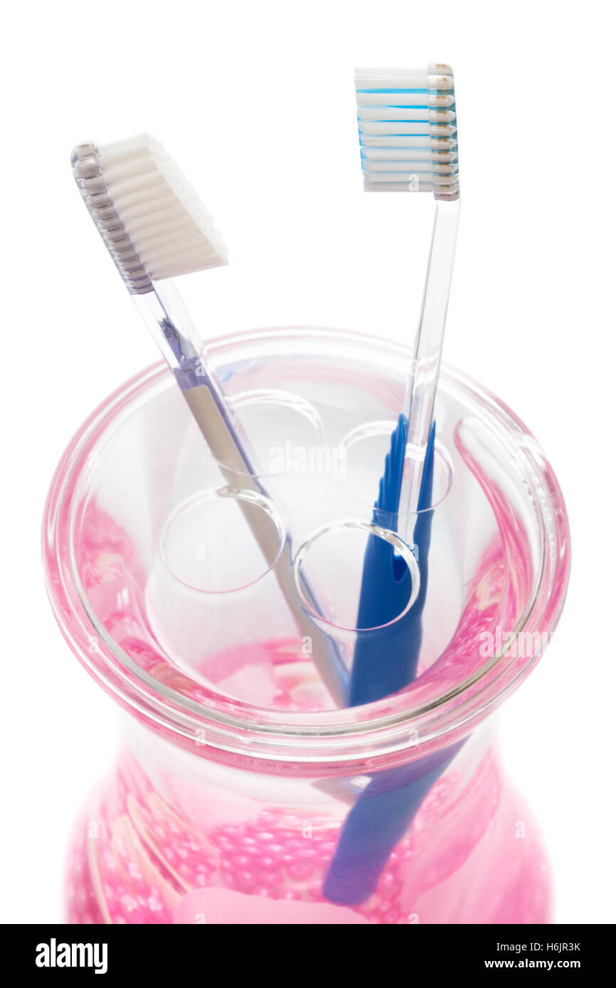 two new toothbrushes on a white background Stock Photo - Alamy