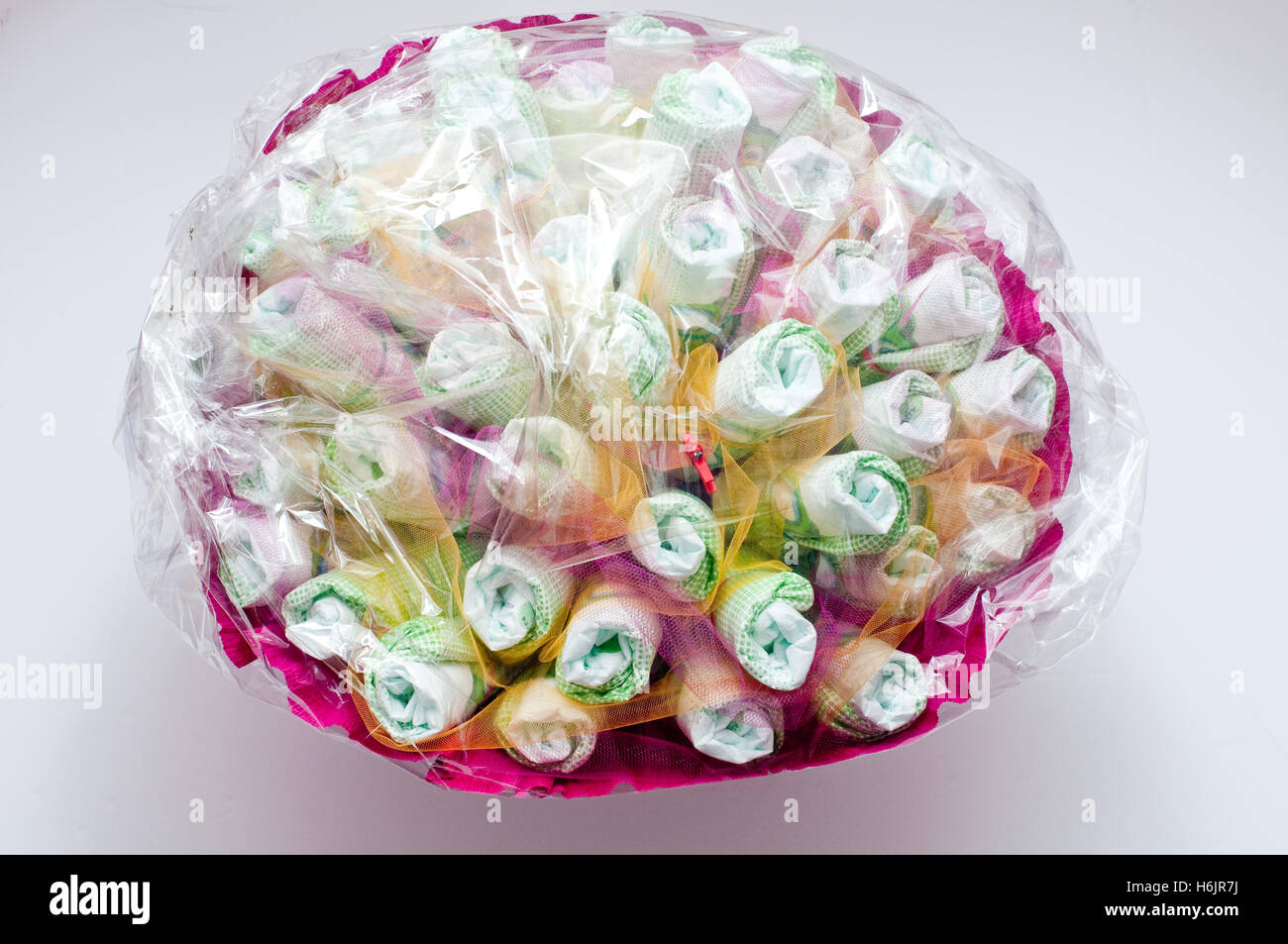 Beautiful basket made with diapers for children Stock Photo Alamy