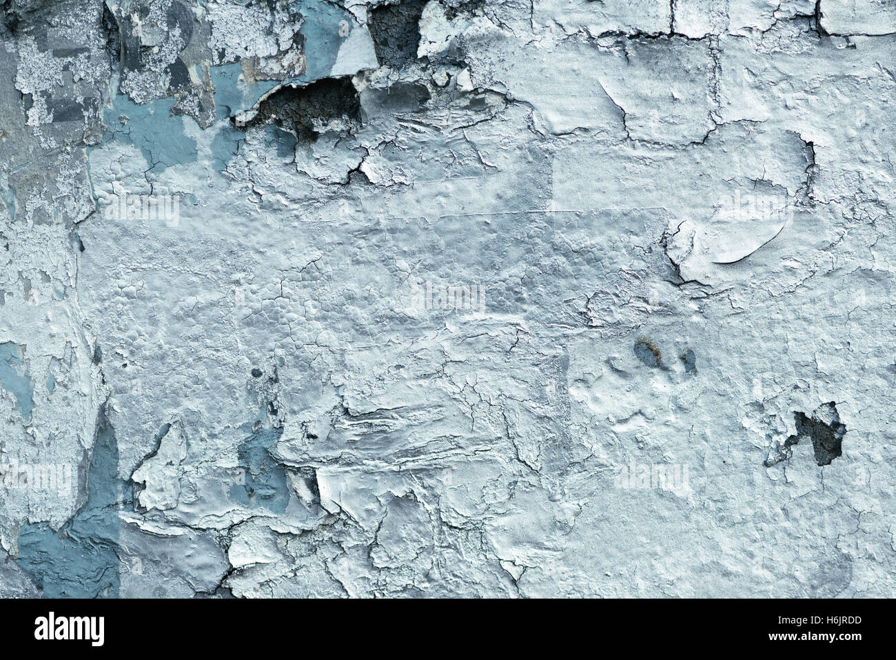 Grunge wall surface with paint peeling off, urban decay texture Stock Photo