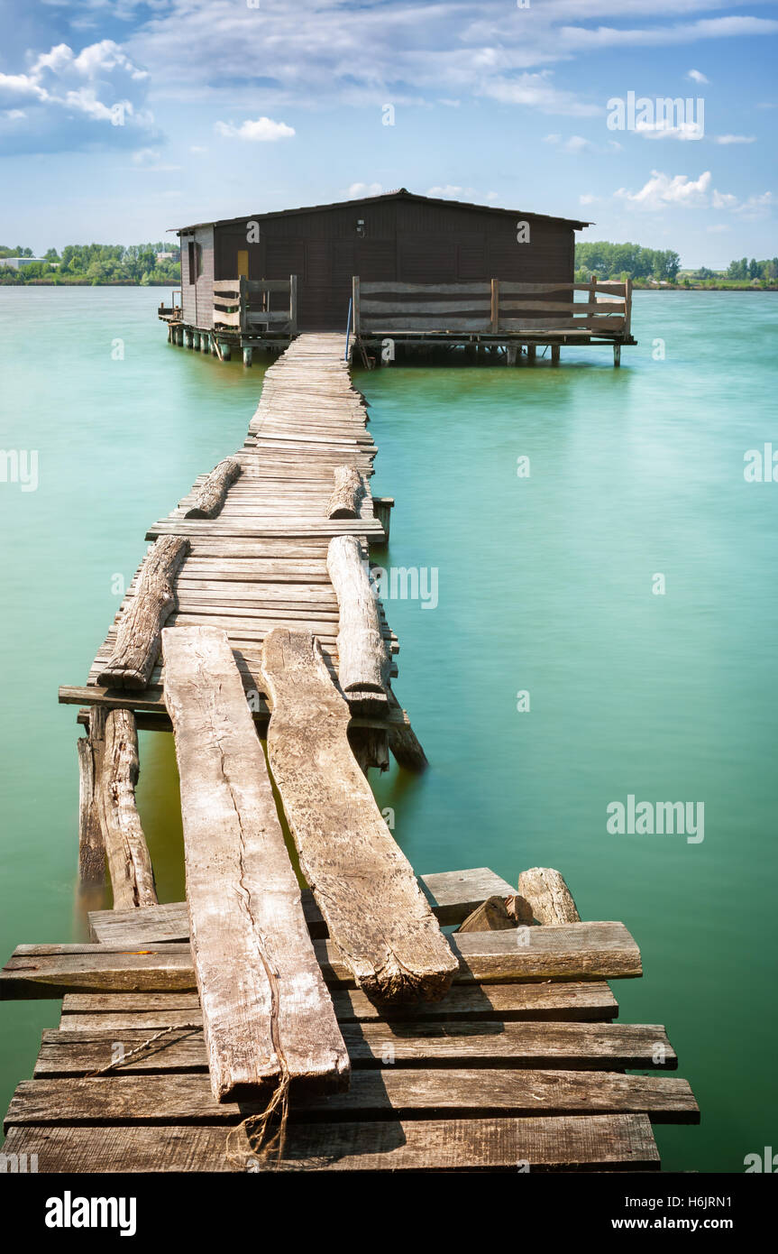 Old fishing hut on a lake Stock Photo Alamy