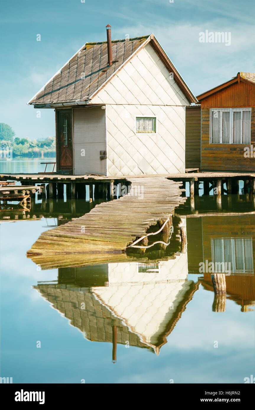 Old fishing hut on a lake Stock Photo Alamy