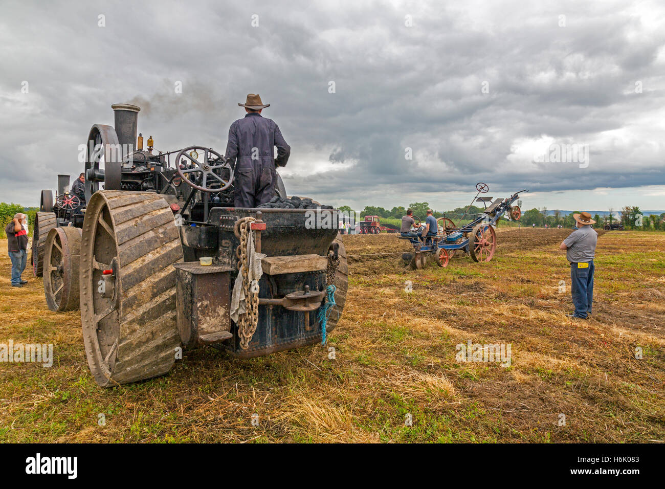 A demonstration of steam ploughing with two ploughing engines at the Low Ham Steam Rally, Somerset, England, UK Stock Photo