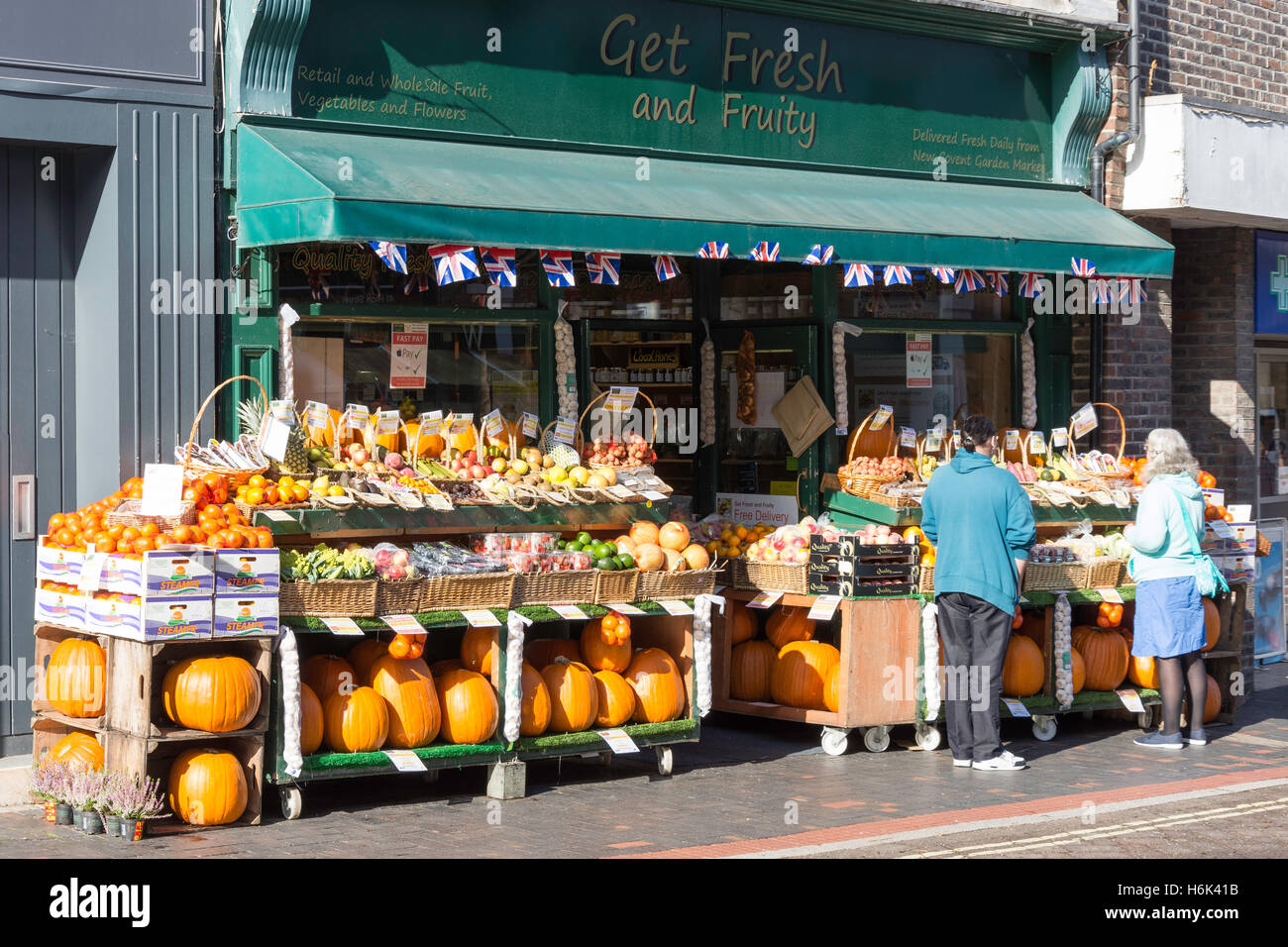 Pumpkin display at Get Fresh fruit and vegetable shop, High Street, Alton, Hampshire, England, United Kingdom Stock Photo