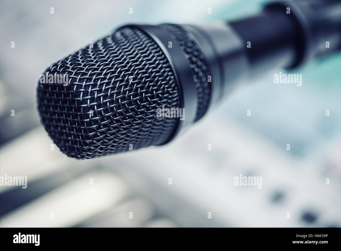 Close-up of microphone in conference room or concert hall. Stock Photo