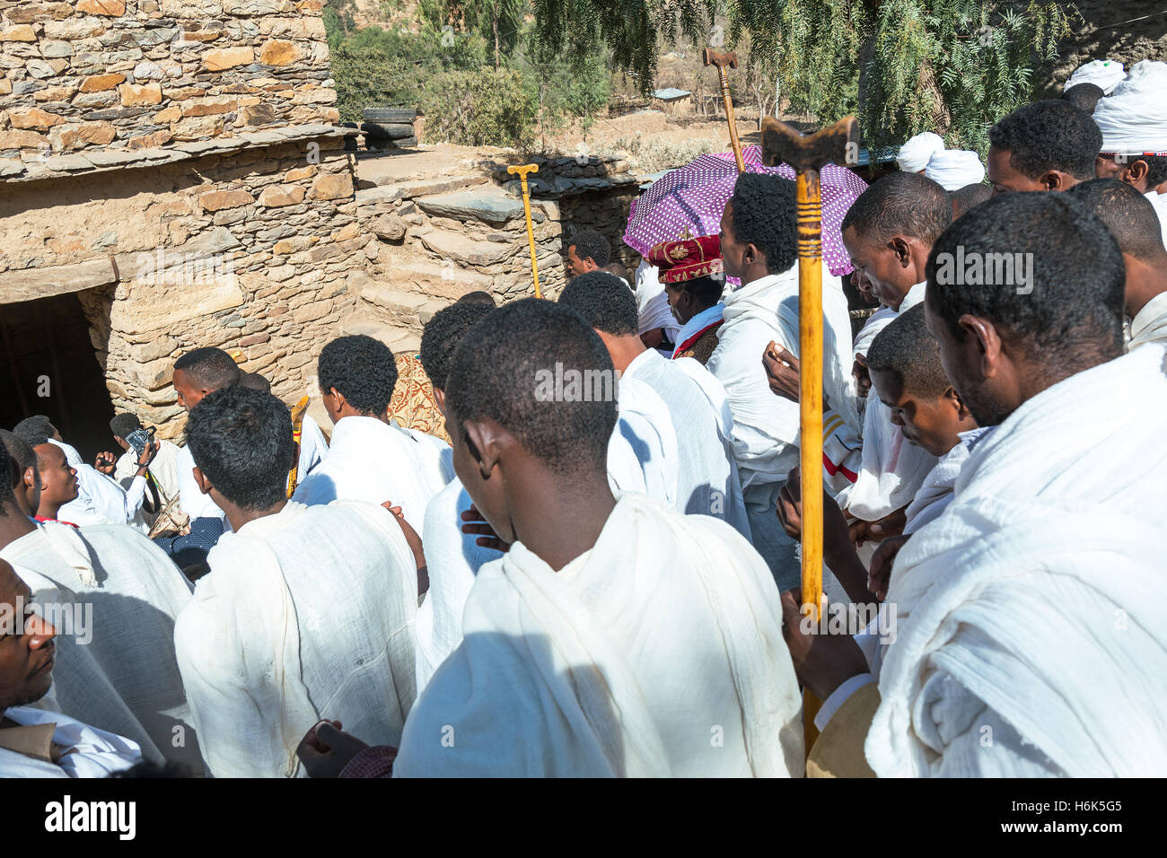 Yeha, Ethiopia - January 21 , 2016: Local faithfuls and priests celebrates the Timkat (Epiphany) fest in the Temple of the Moon Stock Photo