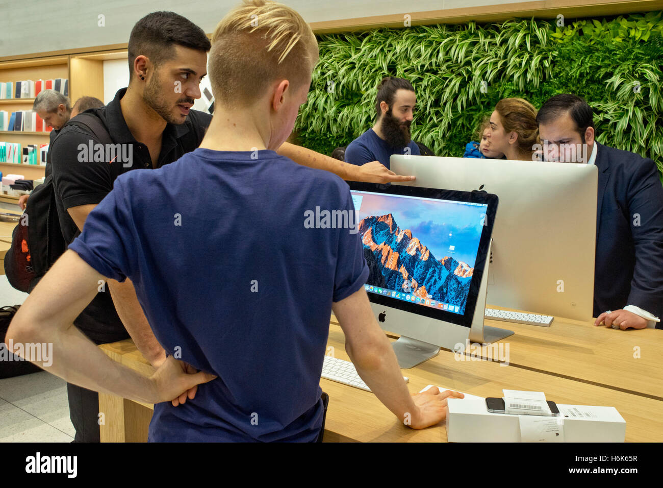 Staff at the Apple Store in downtown Summerlin alert customers