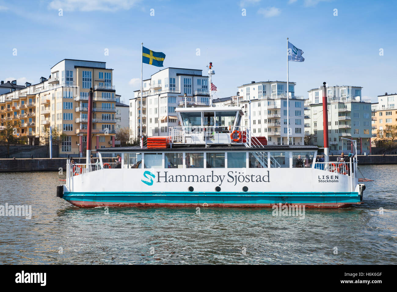 Stockholm, Sweden - May 3, 2016: Small passenger ferry with ordinary people on board, regular public transportation Stock Photo