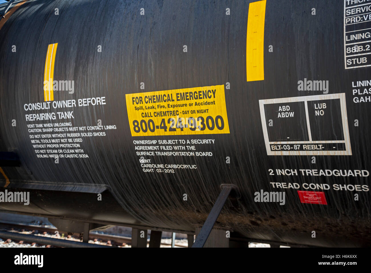 Nogales, Arizona - A railroad tank car with a chemical emergency sign on the track that runs between the U.S. and Mexico. Stock Photo
