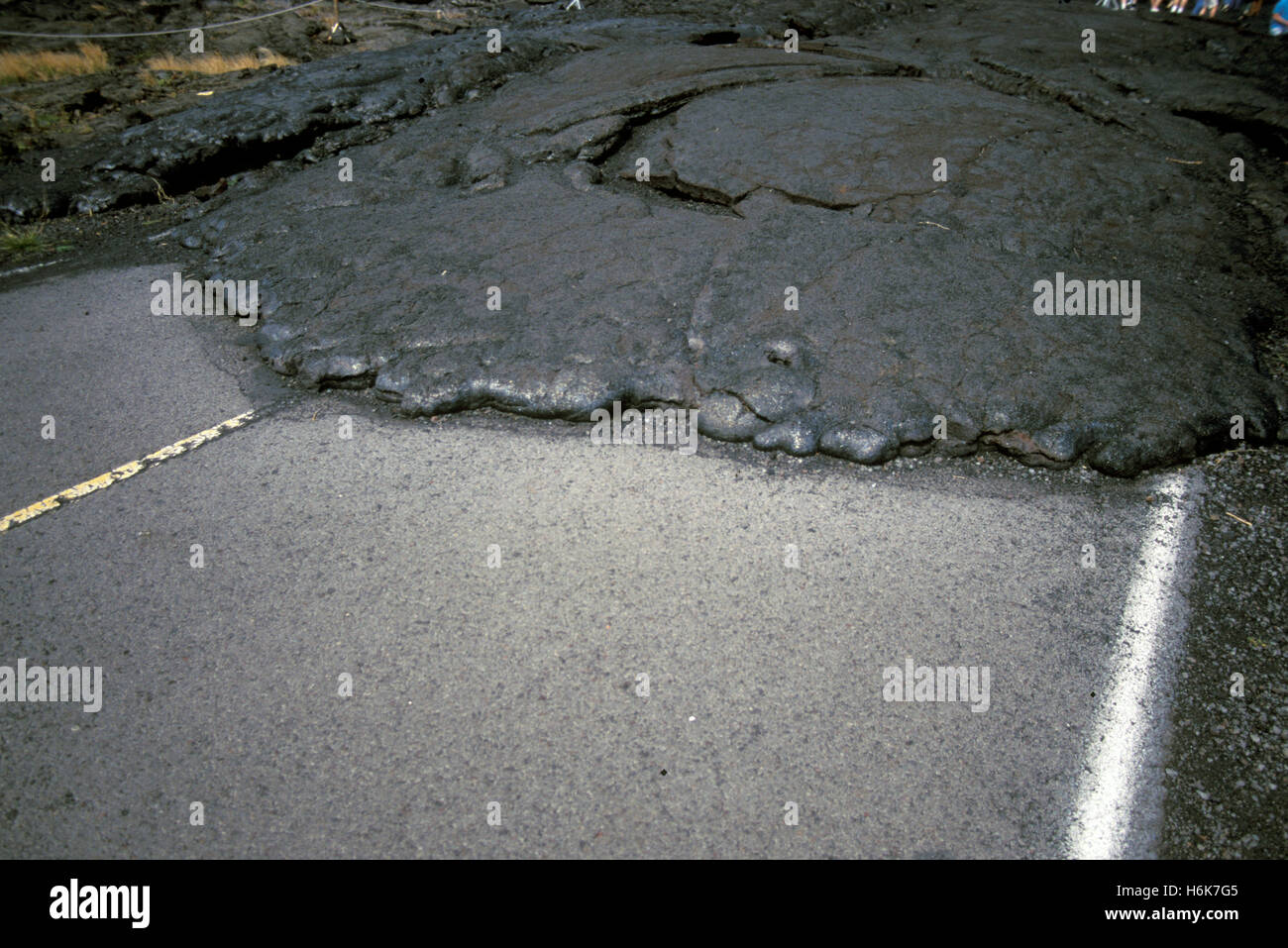 Lava from Mauna Loa volcano covers a road in Volcanoes National Park, Hawaii, Hawaii, United States Stock Photo