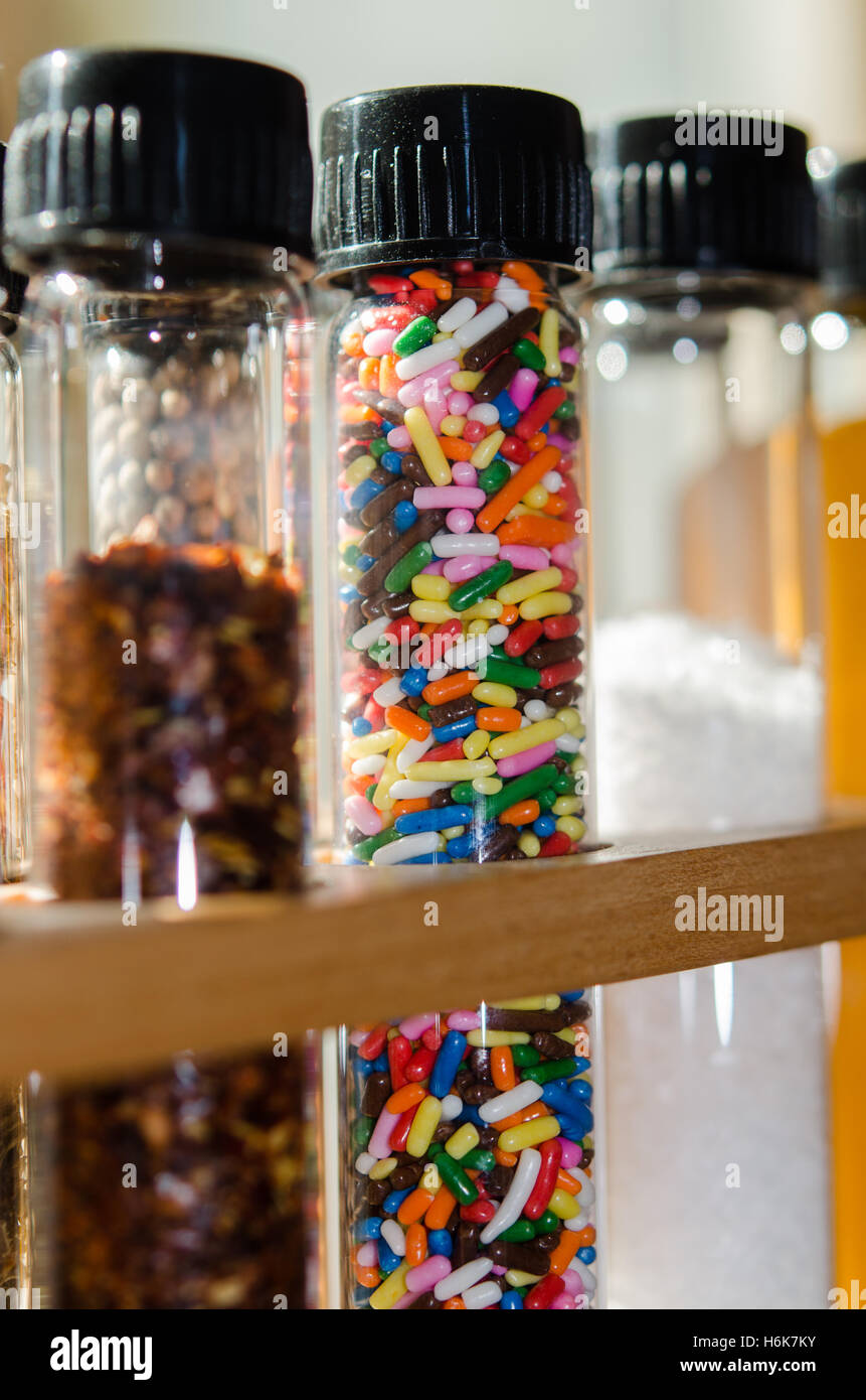Row of test tubes with spices pepper salt and sprinkles Stock Photo Alamy