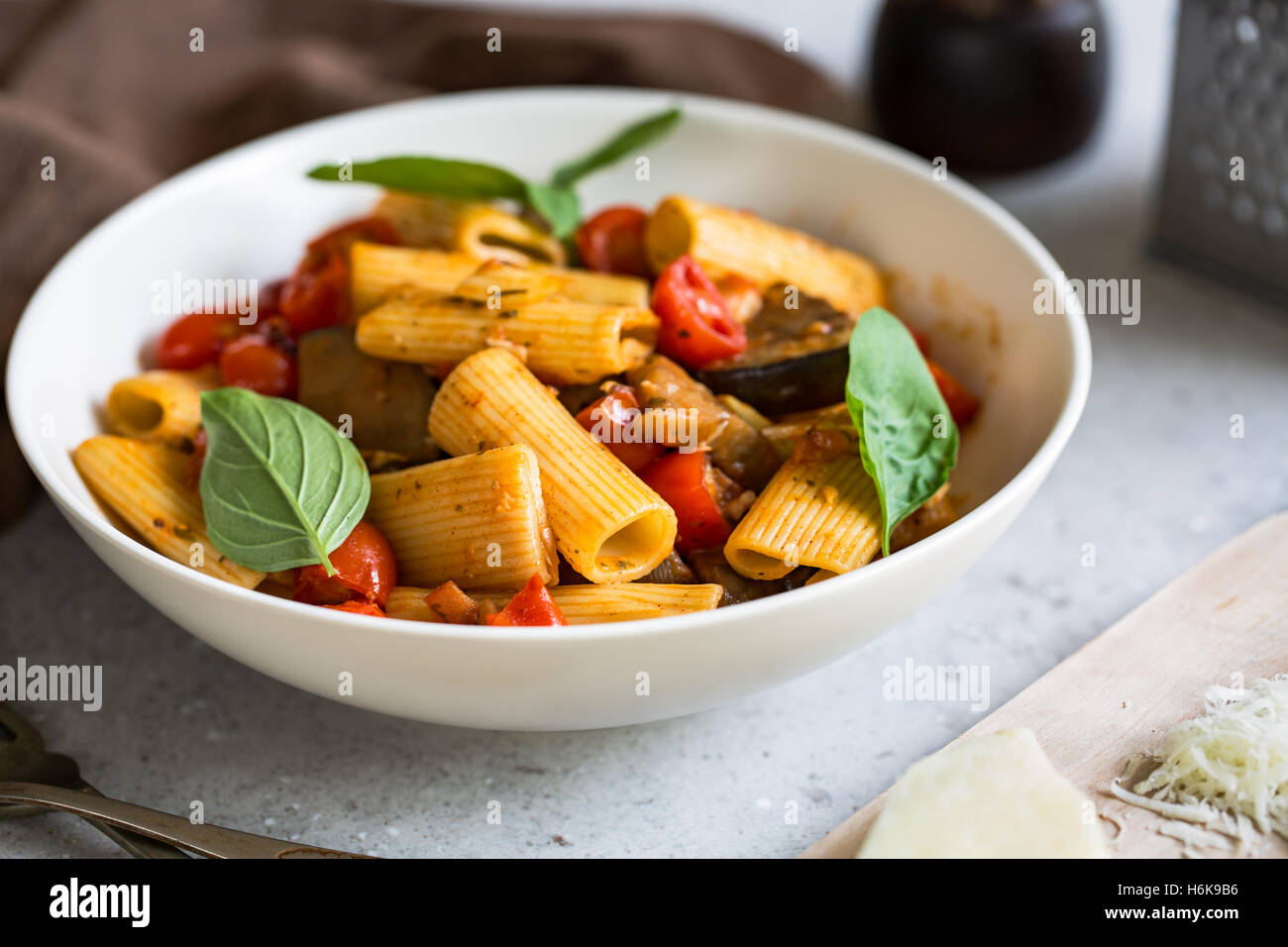 Rigatoni with Aubergine and Cherry Tomato sauce Stock Photo