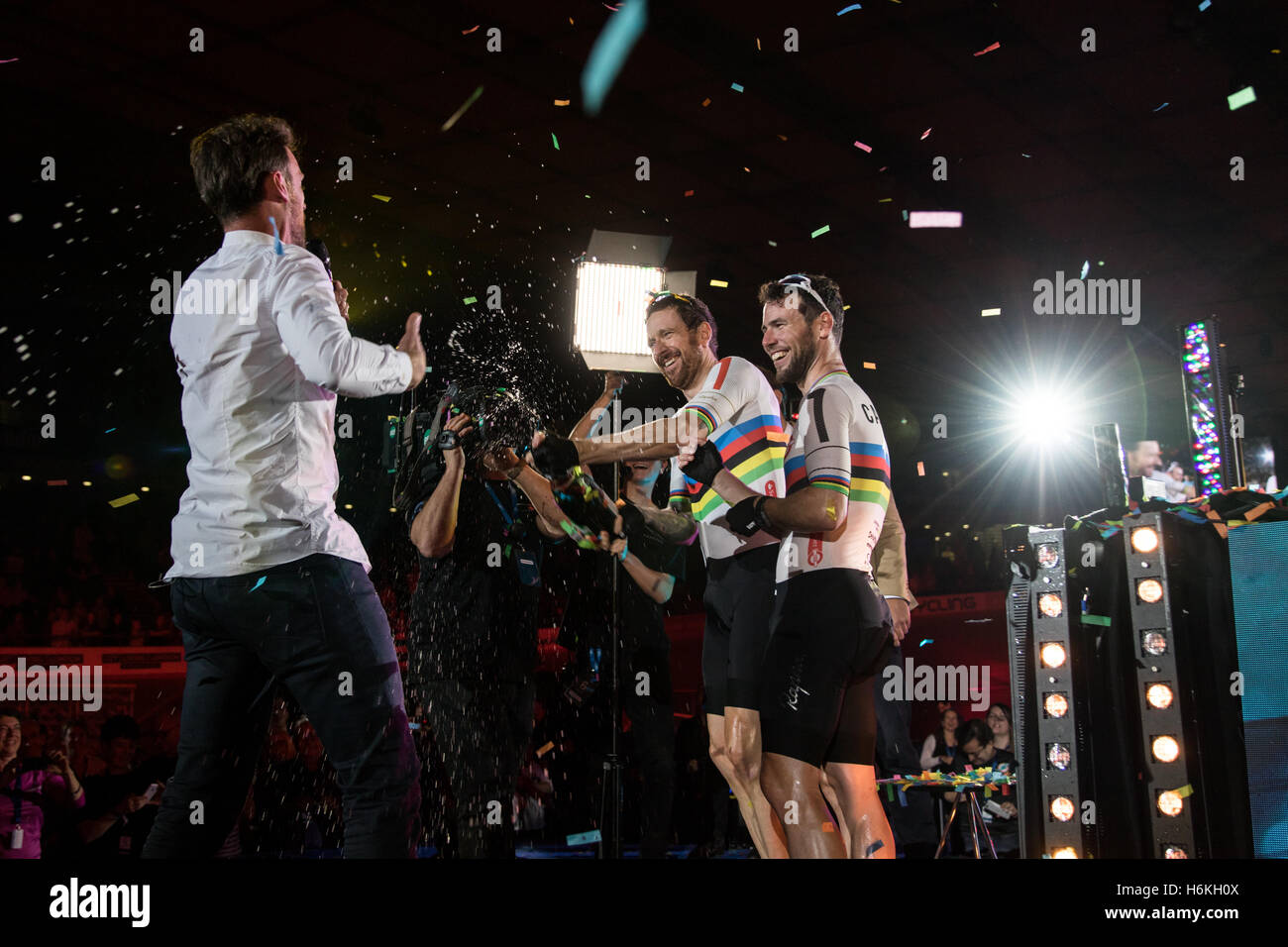 London, UK  30th October, 2016.   Cyclists compete  in the final day of  the London Six Day cycling event.  Lee Valley Velodrome, Olympic Park, London, UK. Bradley Wiggins and Mark Cavendish finish second. Bradley Wiggins pours champagne over the presenter.Copyright Carol Moir/Alamy Live News. Stock Photo