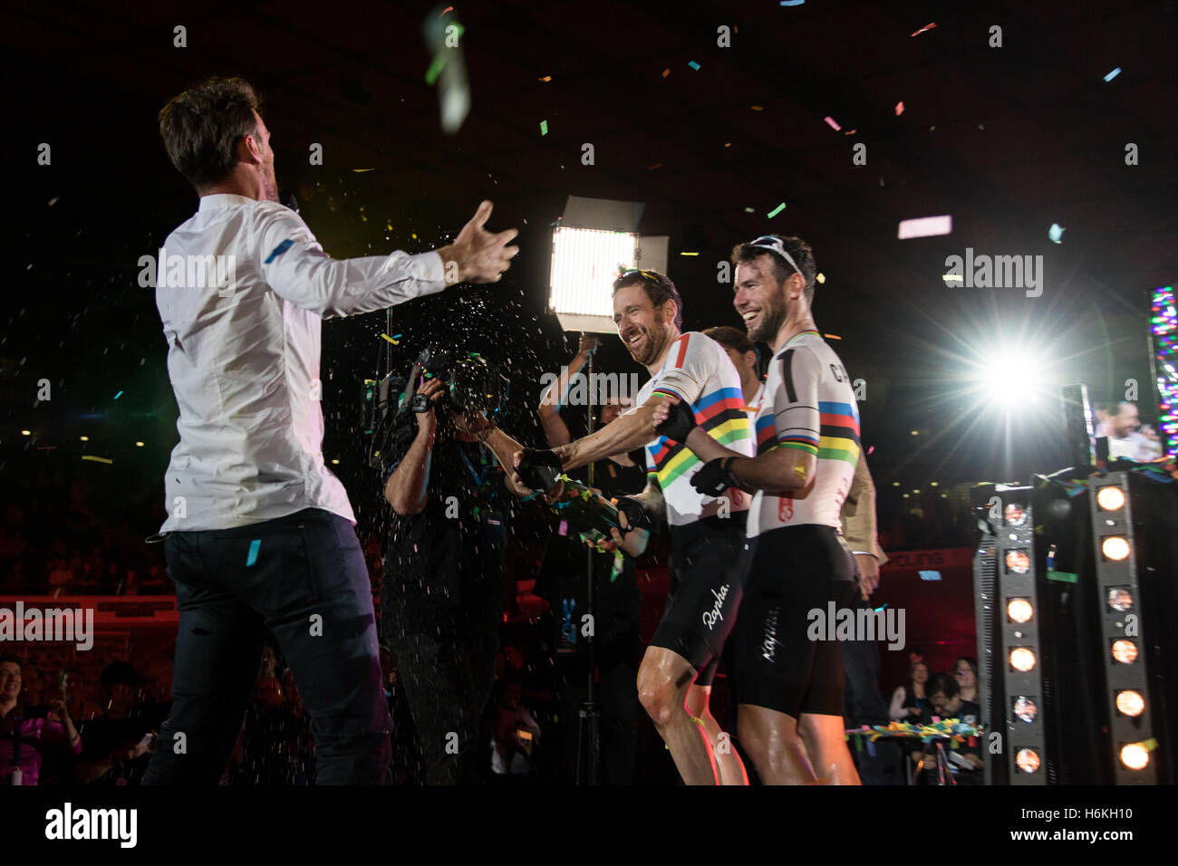 London, UK  30th October, 2016.   Cyclists compete  in the final day of  the London Six Day cycling event.  Lee Valley Velodrome, Olympic Park, London, Bradley Wiggins and Mark Cavendish finish second. Bradley Wiggins pours champagne over the presenter. UK. Copyright Carol Moir/Alamy Live News. Stock Photo