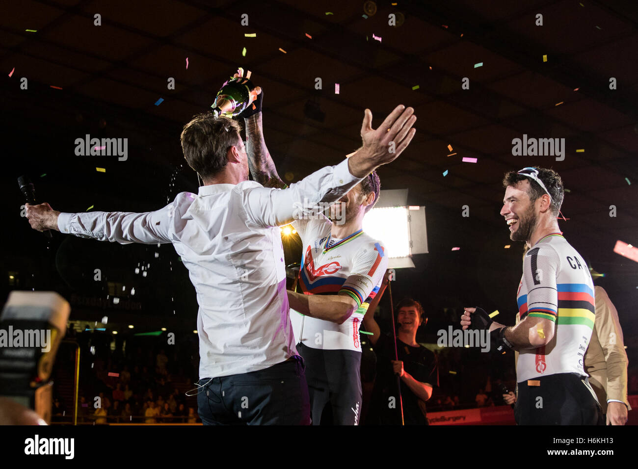 London, UK  30th October, 2016.   Cyclists compete  in the final day of  the London Six Day cycling event.  Bradley Wiggins and Mark Cavendish finish second. Bradley Wiggins pours champagne over the presenter. Lee Valley Velodrome, Olympic Park, London, UK. Copyright Carol Moir/Alamy Live News. Stock Photo