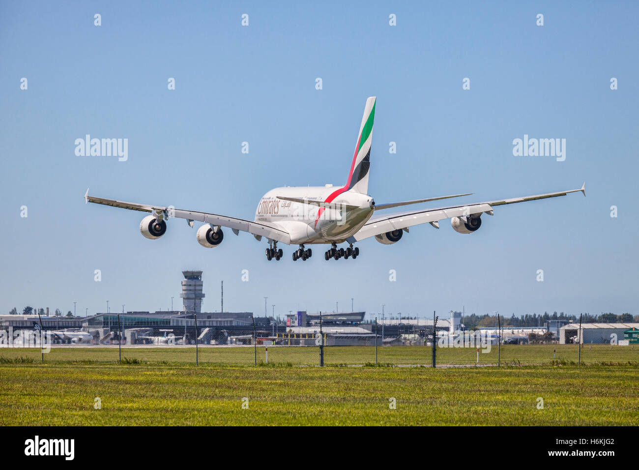 Christchurch, New Zealand. 31 October 2016. The first Airbus A380 to land at Christchurch International Airport, inaugurating a service by Emirates from Dubai via Sydney. The arrival was watched by crowds from the airport perimeter roads. Stock Photo
