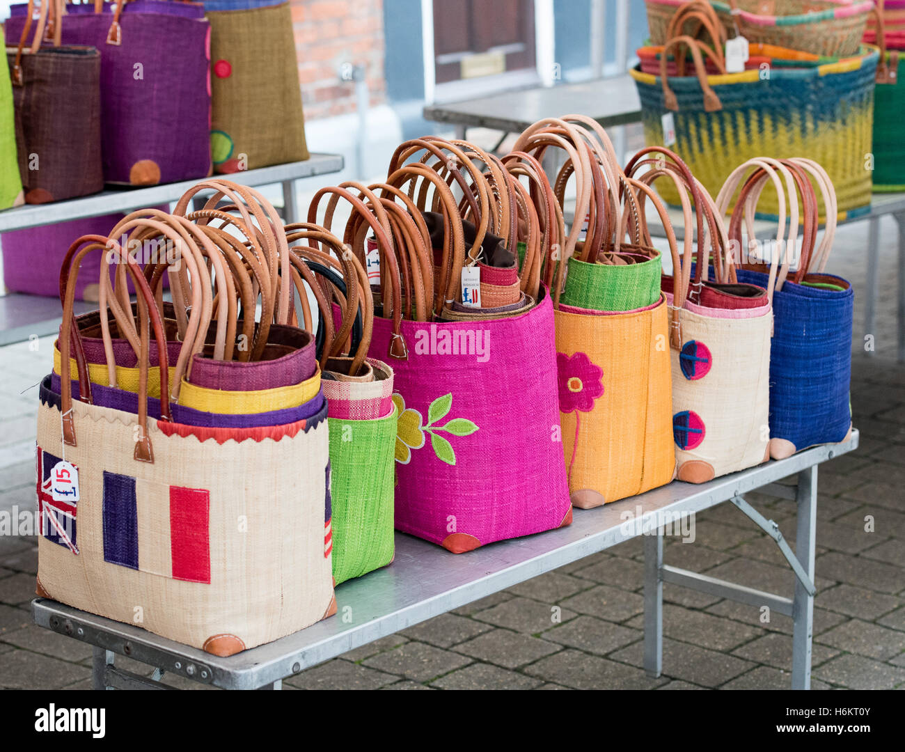 Handbags for sale at a French Street market, Brentwood, Essex Stock Photo