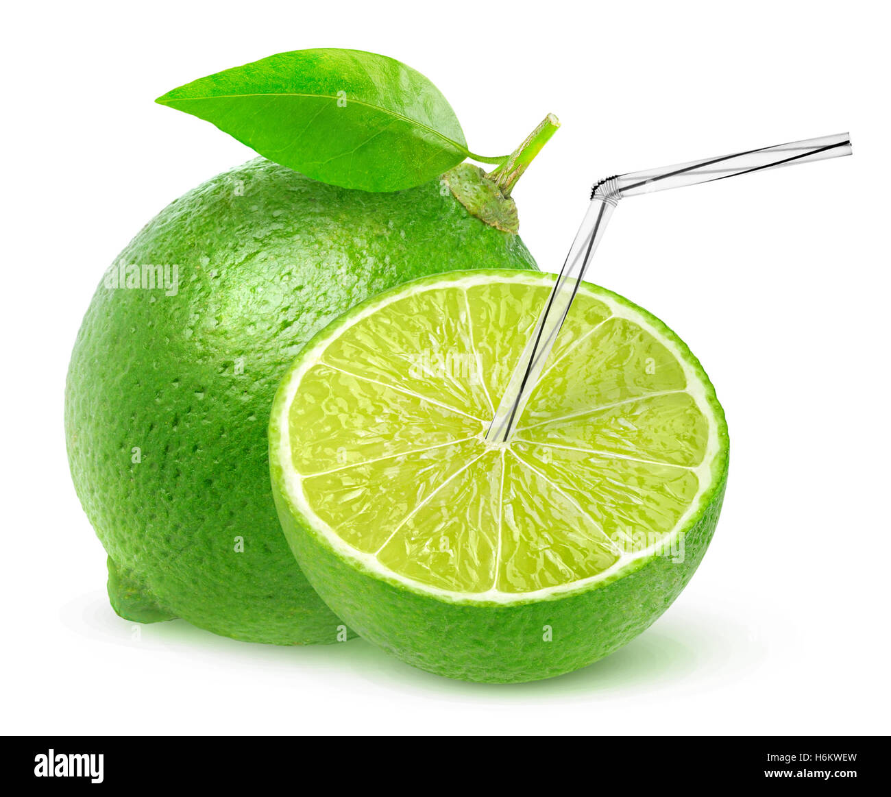 Isolated lime juice. One and a half lime fruit with straw in it, natural  fresh juice concept isolated on white background with c Stock Photo - Alamy