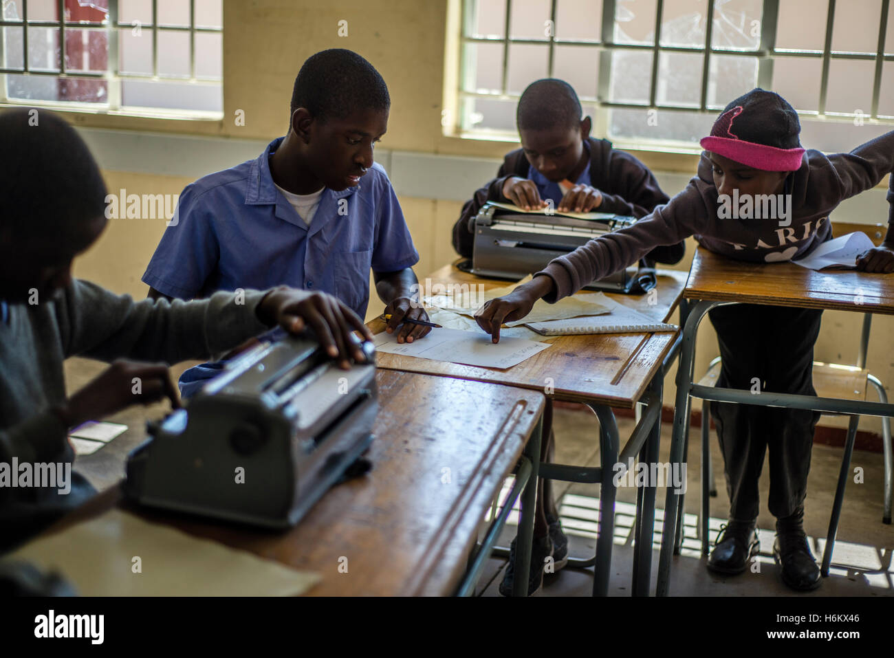 Learners of the Eluwa Special School types on a typewriter during