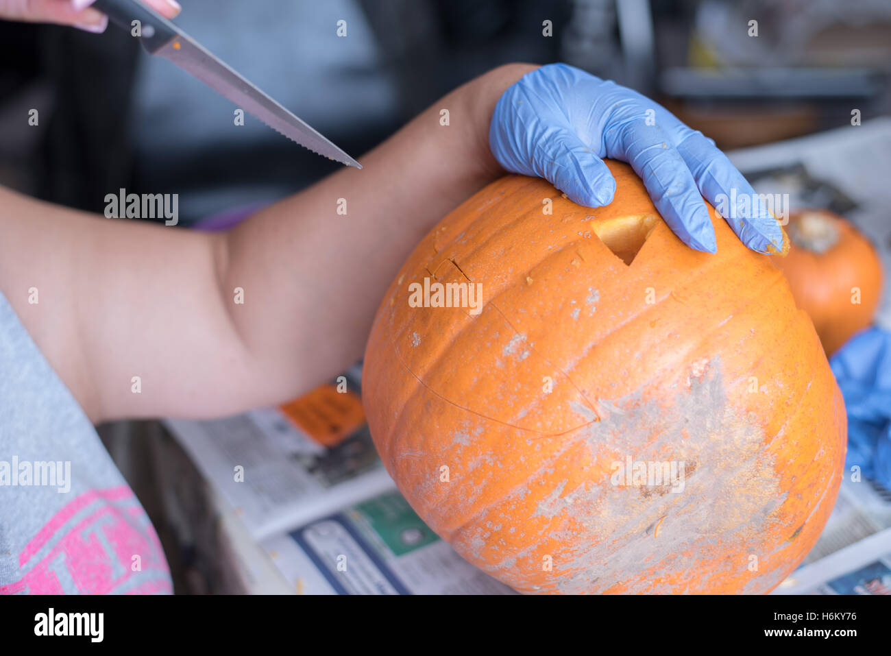 pumpkin carving- knife out Stock Photo