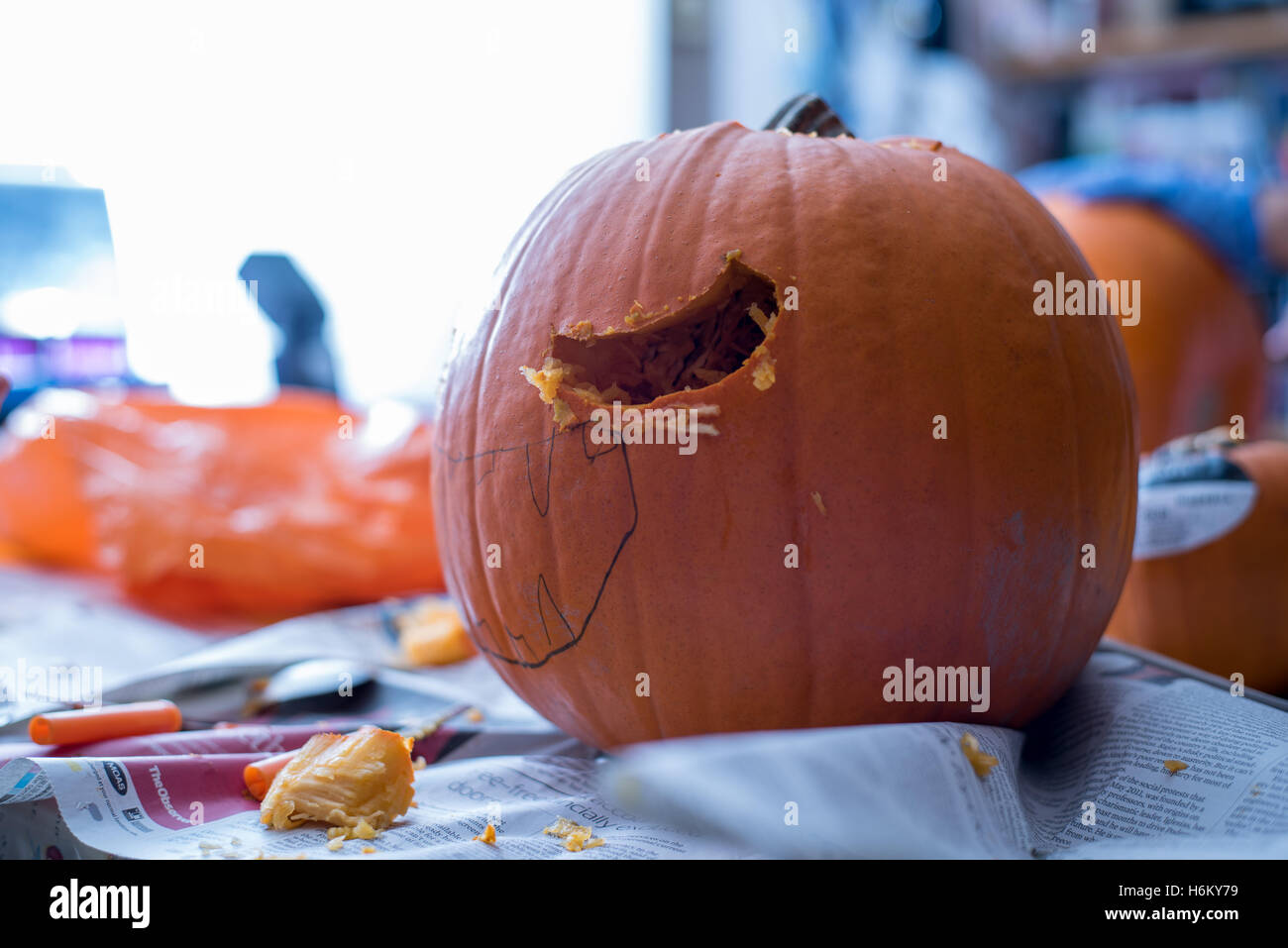 pumpkin carving, nearly finished Stock Photo