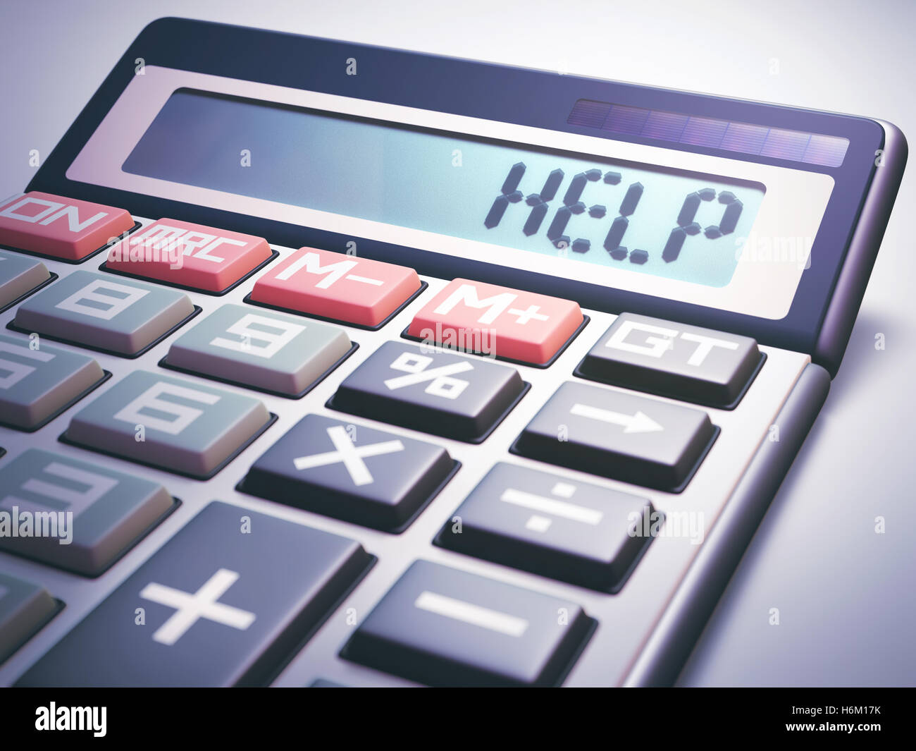 Solar calculator showing on the digital display the word 'HELP'. Stock Photo