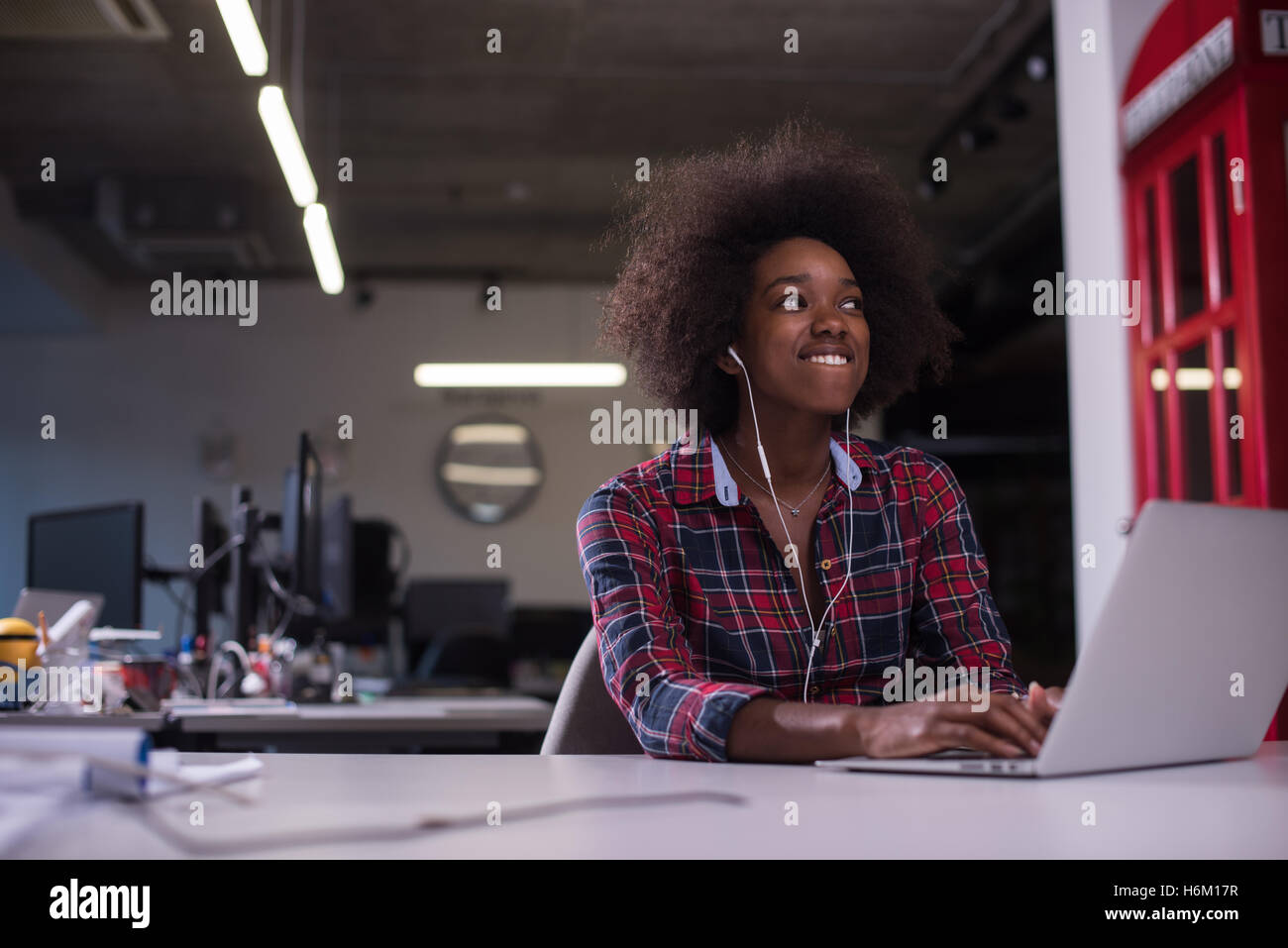 portrait of a young successful African American beautiful woman who ...