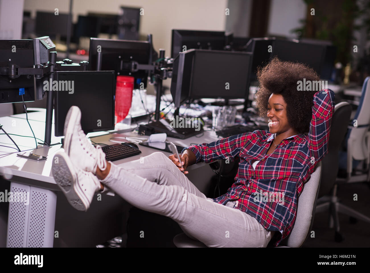 portrait of a young successful African American beautiful woman who ...