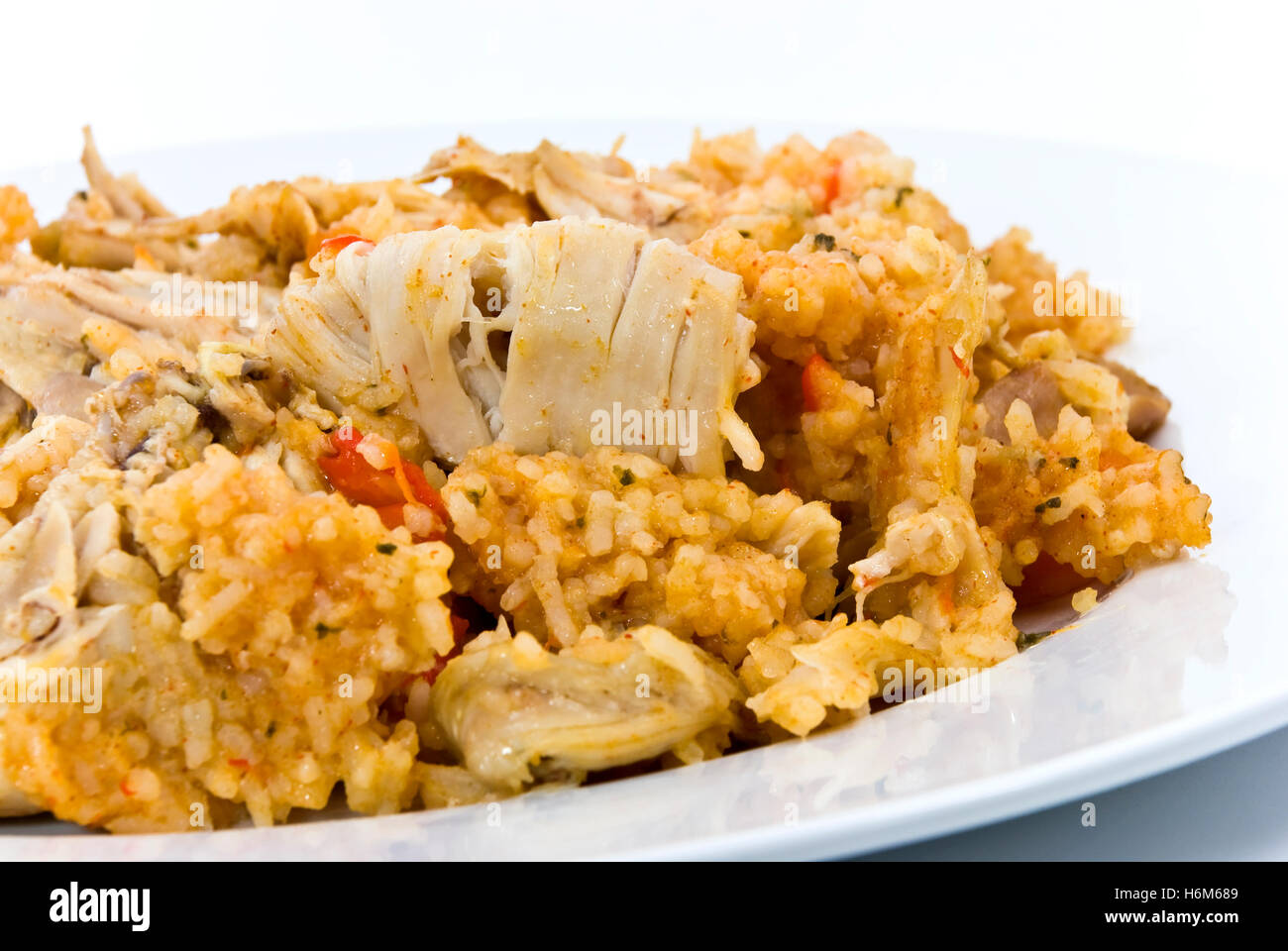 risotto with fried chicken Stock Photo Alamy