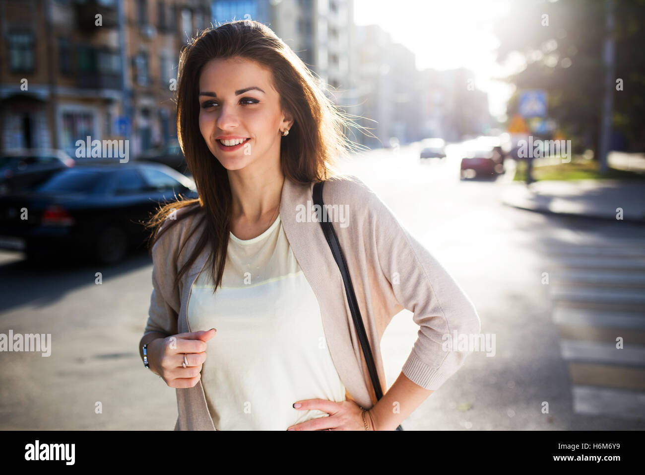 Portrait of beauty woman with perfect smile walking on the street and ...