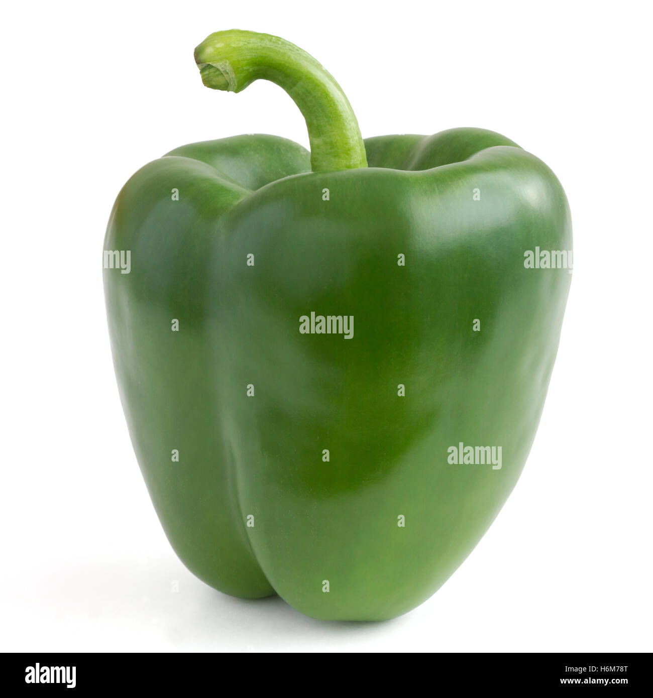 Single green bell pepper isolated on white. Stock Photo