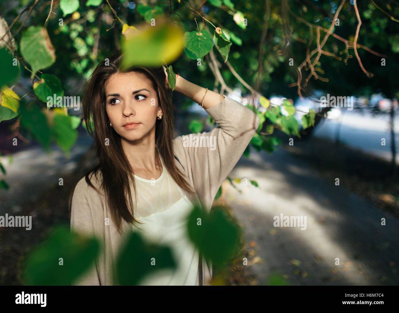 Young pretty woman outdoor portrait. Beautiful girl in casual dress Stock Photo