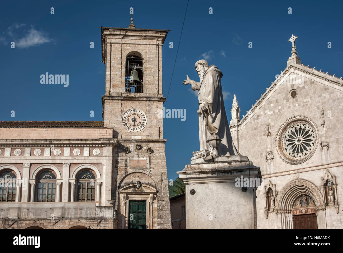 Main church of St Benedict with the statue and monastery in Norcia In