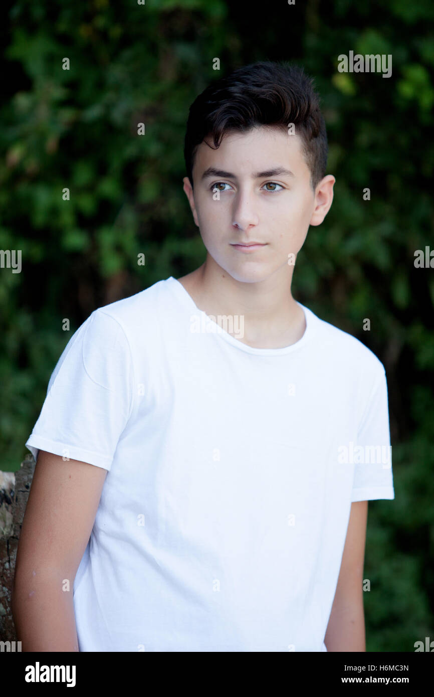 Handsome Brown Haired Teen In The Park Stock Photo 124609065 Alamy