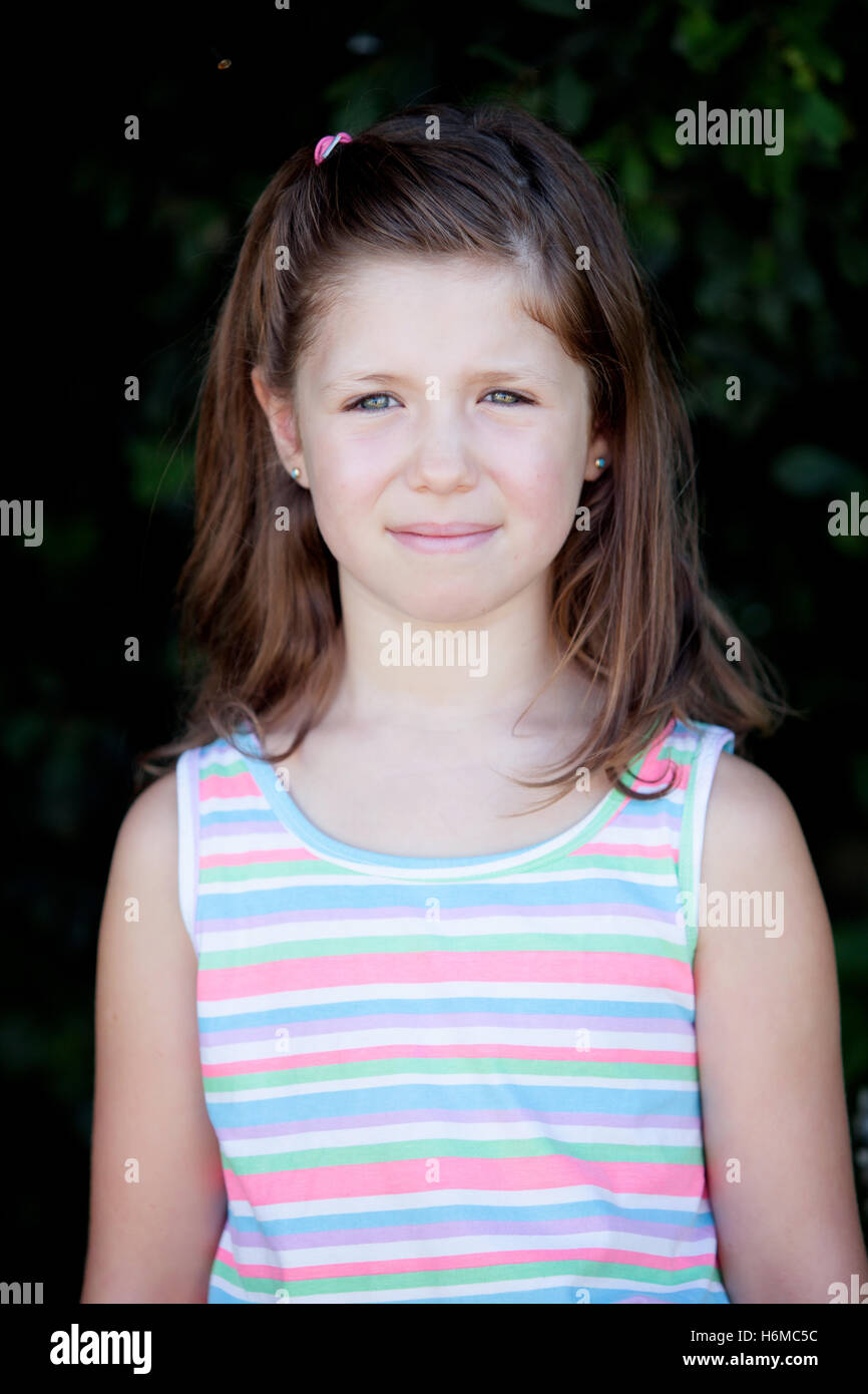 https://c8.alamy.com/comp/H6MC5C/pretty-eight-year-old-girl-with-blue-eyes-in-the-park-H6MC5C.jpg