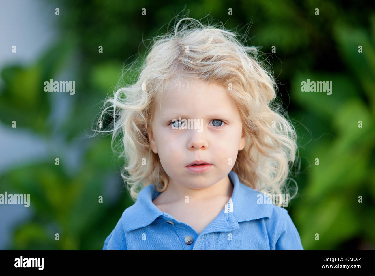 Small Boy Curly Hair Sitting Stock Photos Small Boy Curly Hair