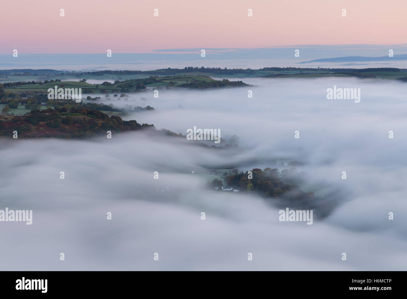 Cloud inversion over Ullswater before dawn in the Lake District, England Stock Photo