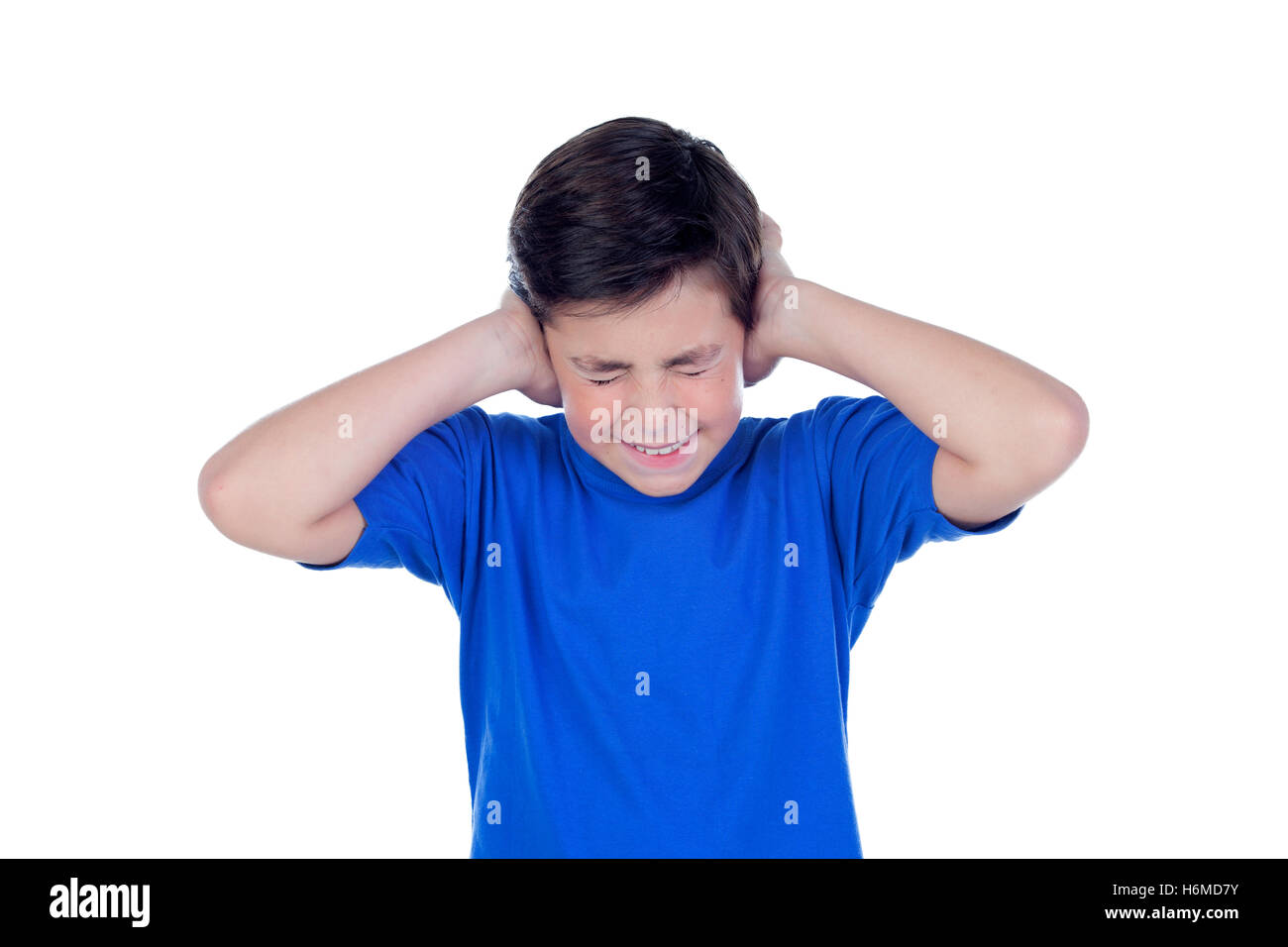 Stressed child covering his ears isolated on white background Stock