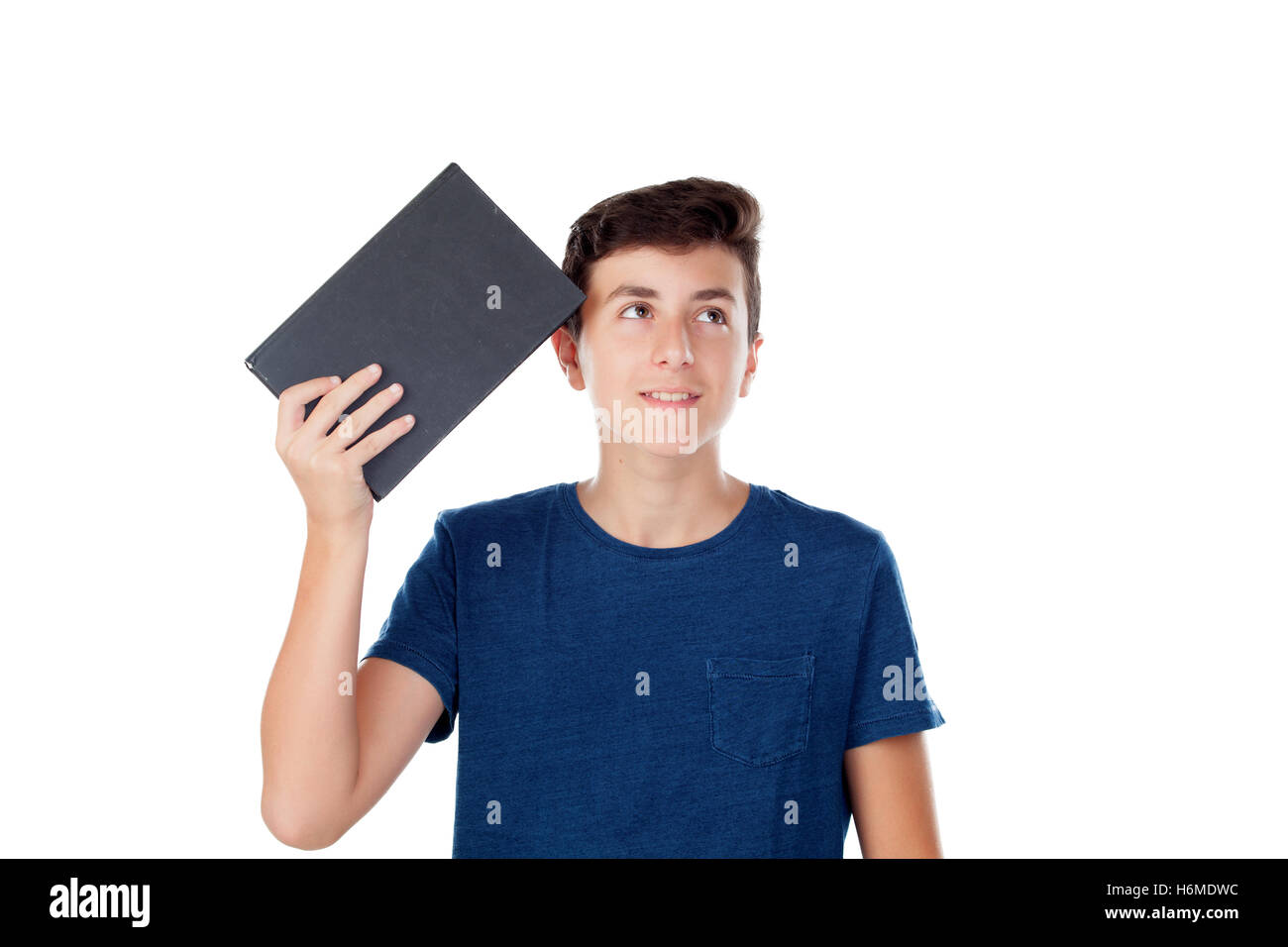 Teenager kid with a book isolated on a white background Stock Photo - Alamy