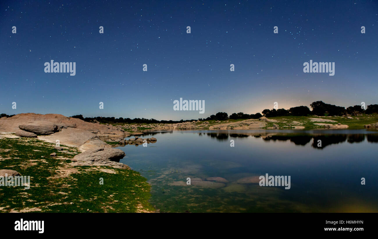 Night picture of a beautiful lake with stars in the sky Stock Photo - Alamy