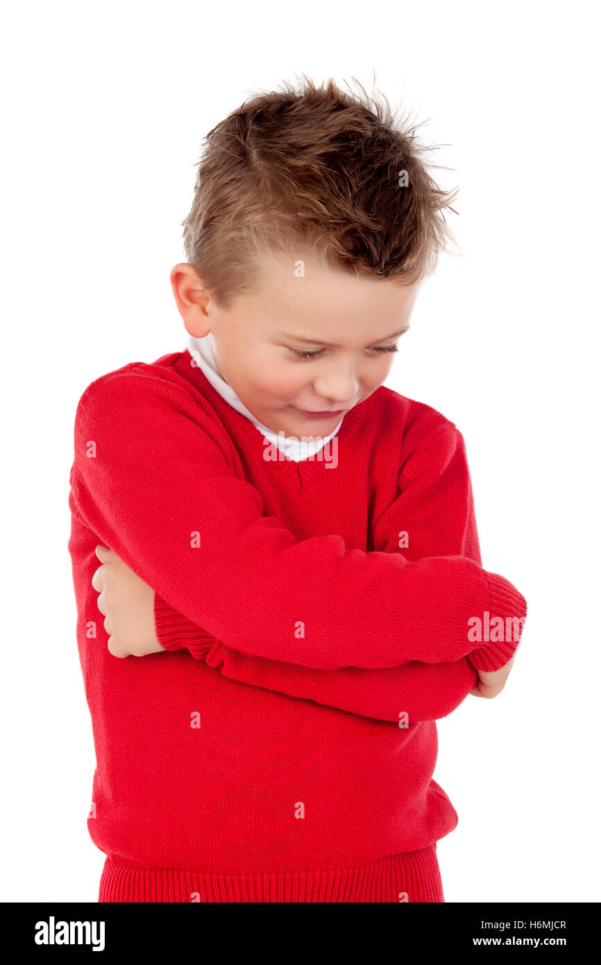 Little angry kid with red jersey isolated on a white background Stock Photo
