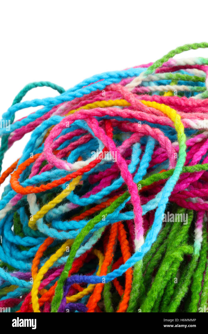 Tangled colorful sewing threads on white background Stock Photo Alamy