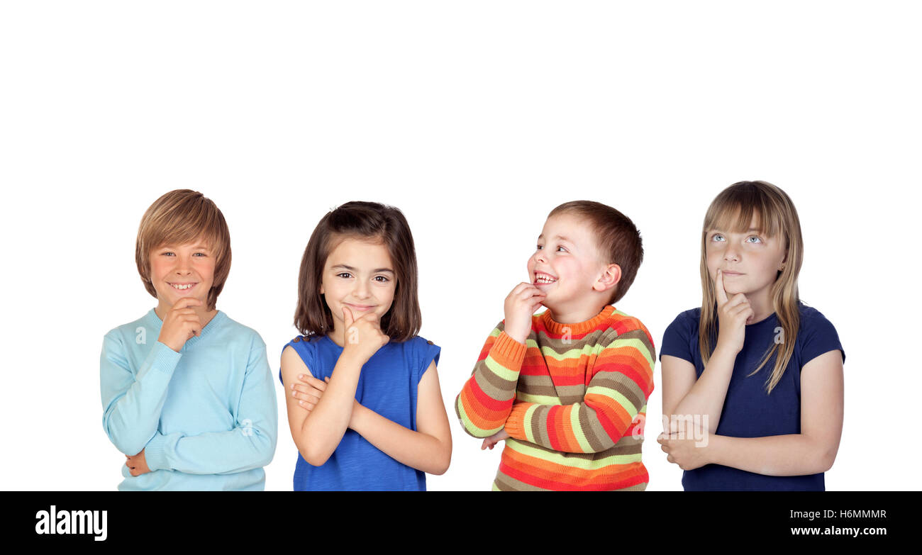 Four pensive children isolated on a white background Stock Photo