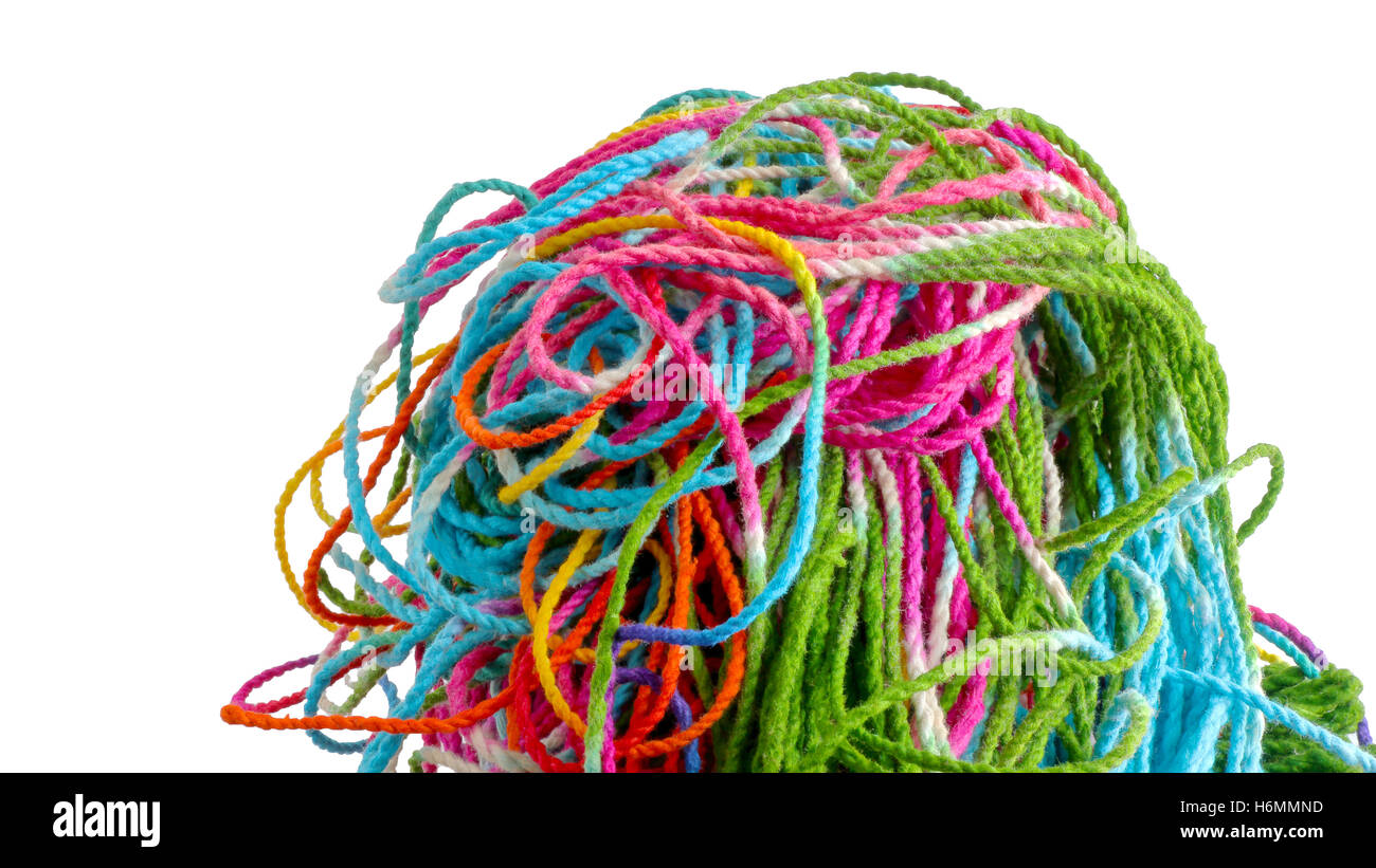 Tangled colorful sewing threads on white background. Stock Photo