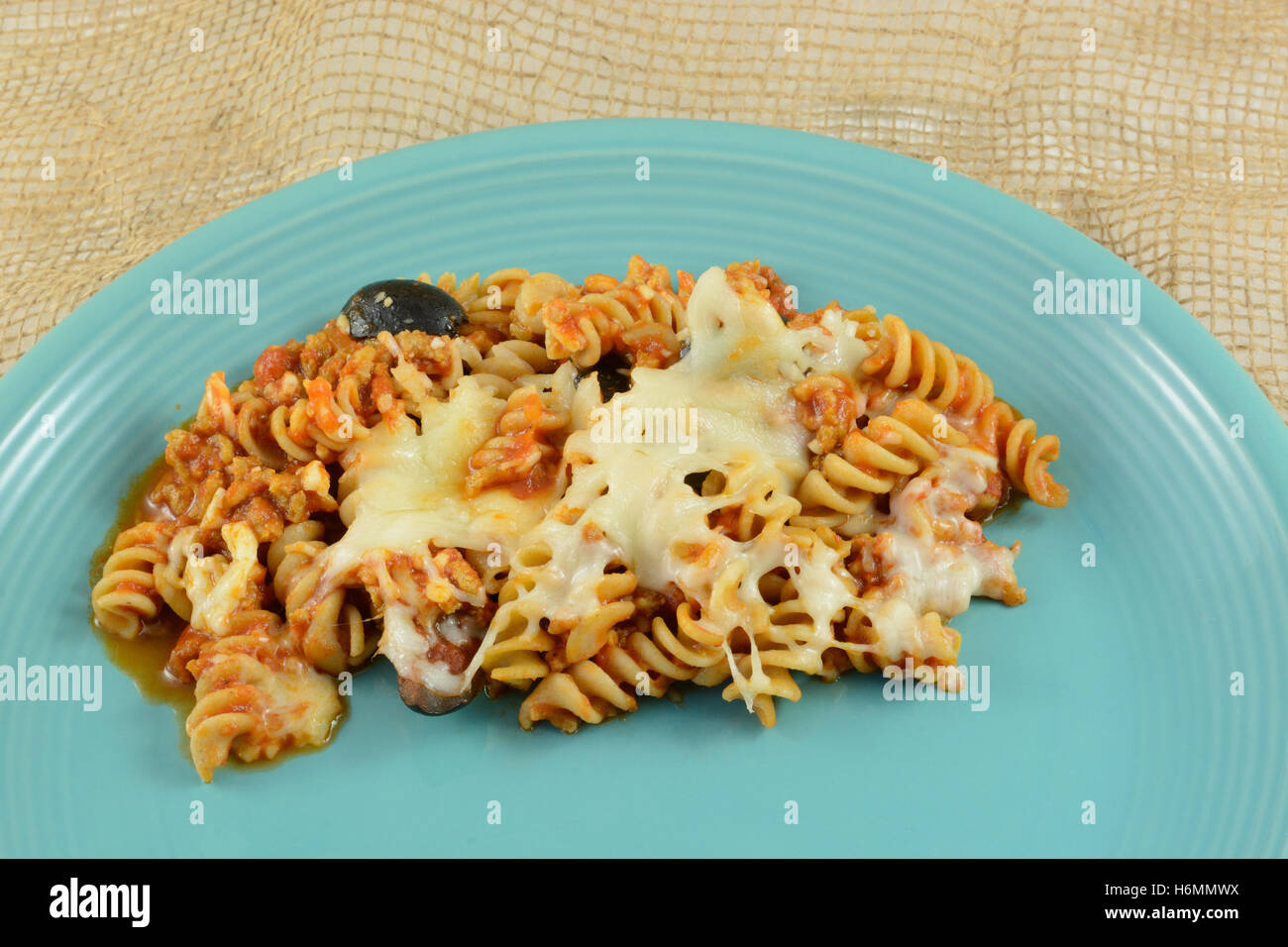 Casserole serving of whole wheat rotini pasta, ground turkey meat