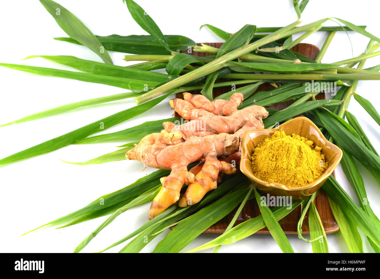 Turmeric roots and powder Stock Photo Alamy