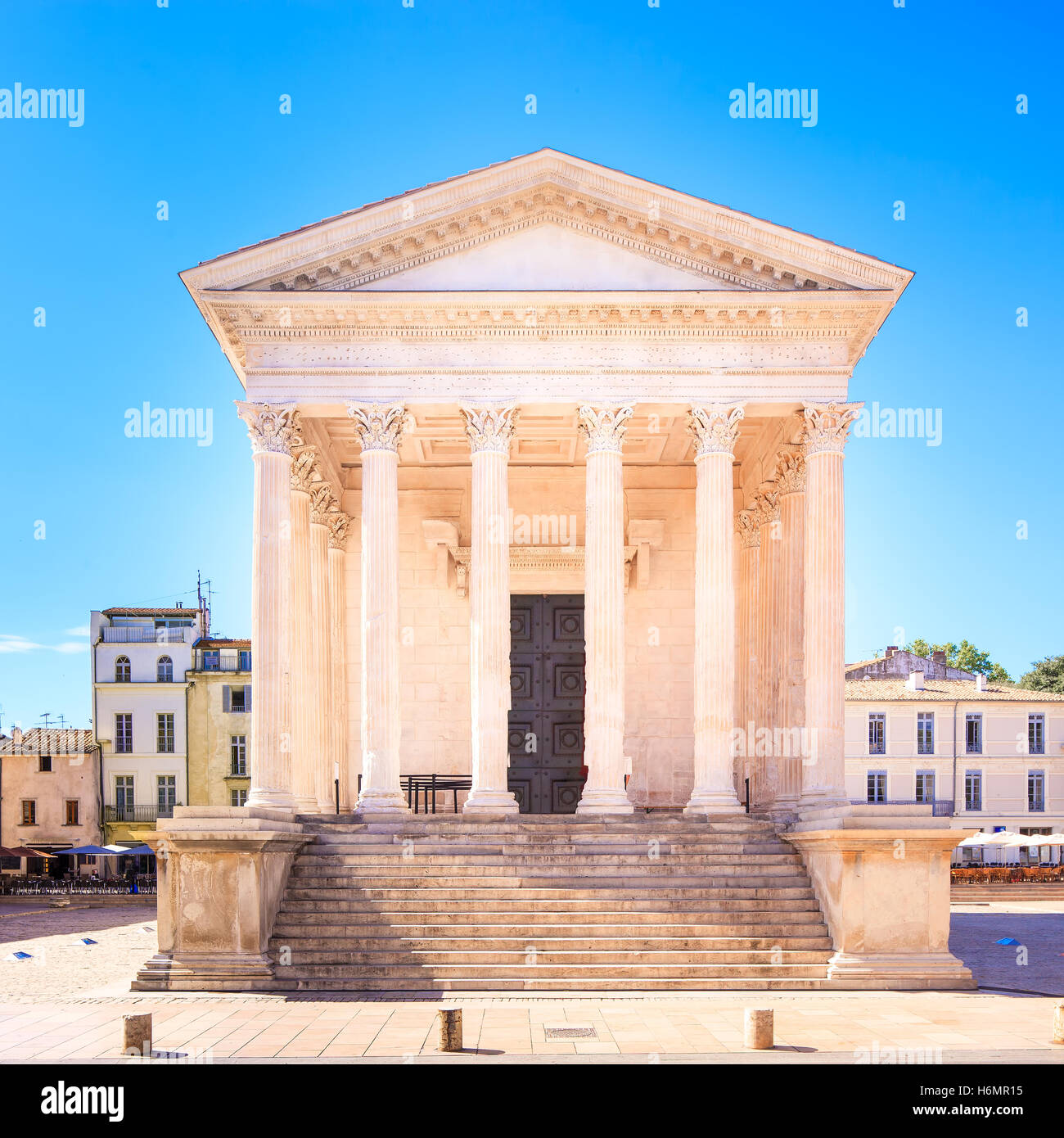 La Maison Carree roman temple column architecture. Ancient building of Roman Empire. Nimes, Languedoc Roussillon, France, Europe Stock Photo