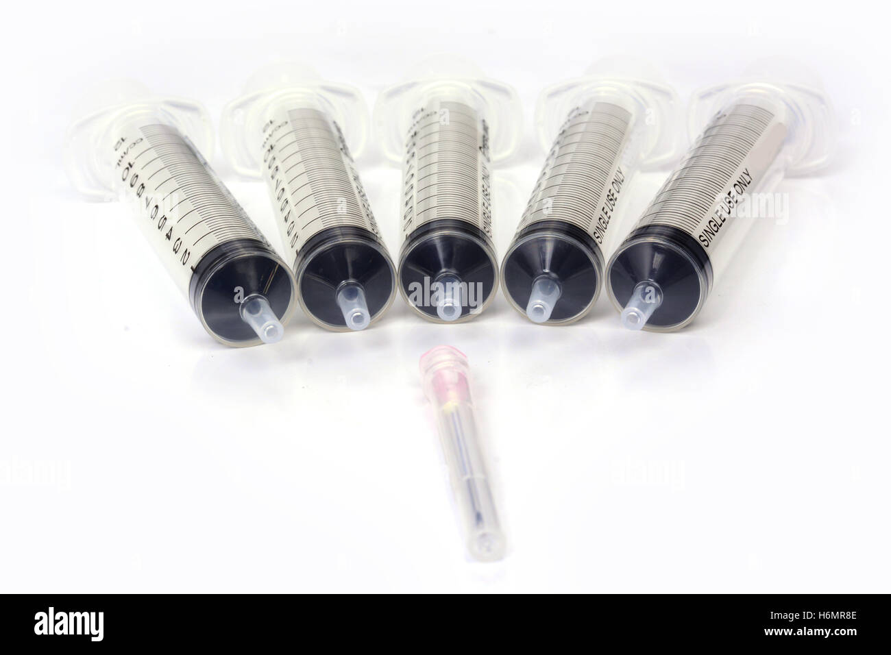 Medical syringes on a white Stock Photo